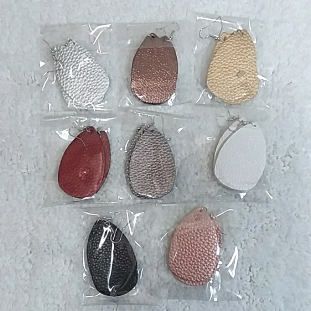 8 Pair Of Faux Leather Earrings
